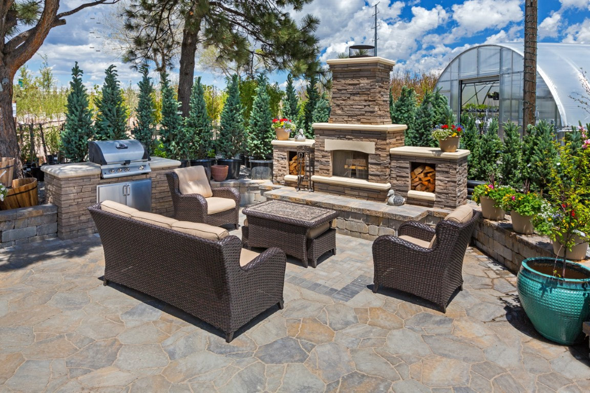 An image of a beautiful backyard patio with brick paving design