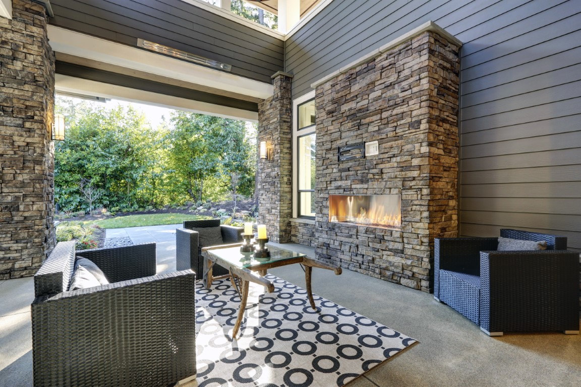 An image of a beautiful brick patio fire pit inside a house